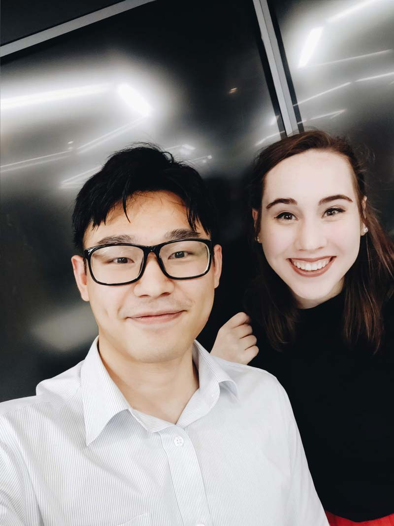 Two English teachers wearing business attire