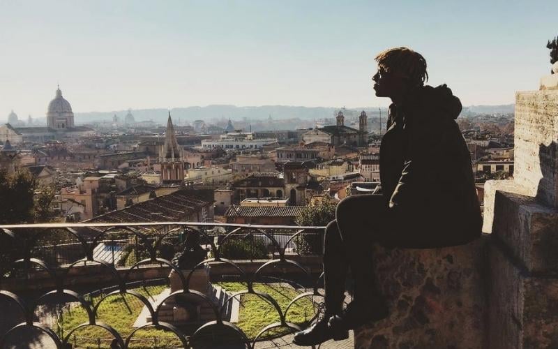 how to get paid to work abroad as a digital nomad