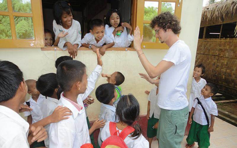 English teacher in Myanmar with his tefl students