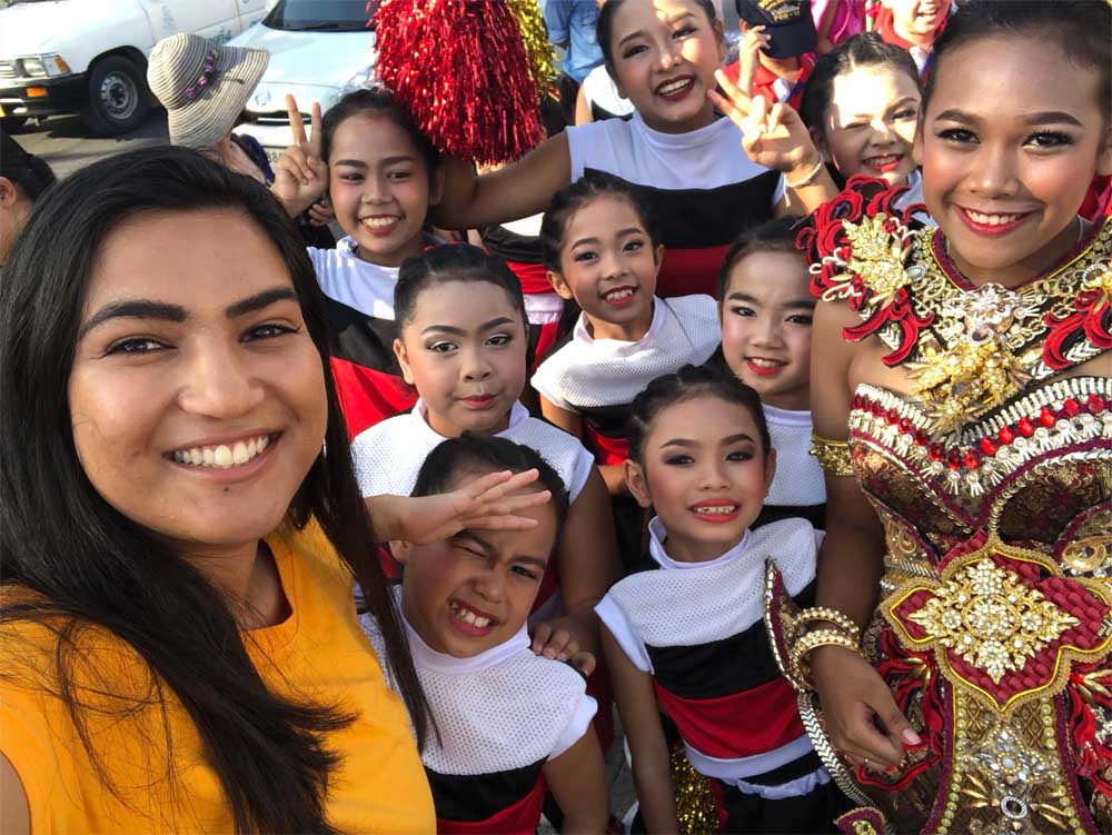 an English teacher in Vietnam with her Vietnamese students