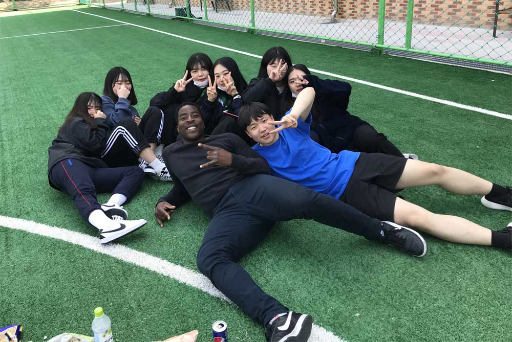 EPIK Program English Teacher in South Korea with his students