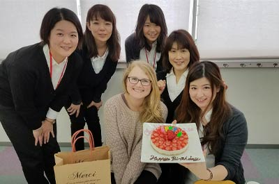 a business English teacher and her TEFL adult students