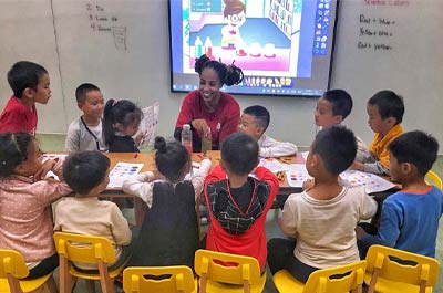 an ESL teacher teaching English to kids